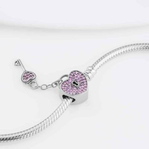 babfed59d307e7d855b8233c0584a717-5.jpg Срібний шарм Серце з ключиком рожеве