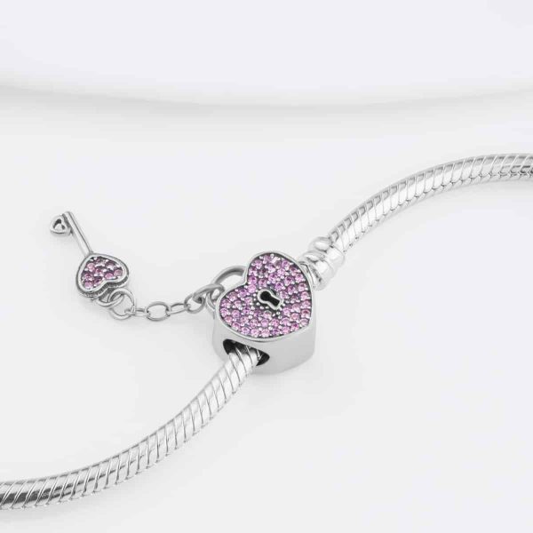 babfed59d307e7d855b8233c0584a717-5.jpg Срібний шарм Серце з ключиком рожеве