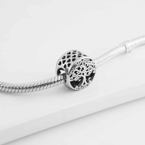 eafcf10f8facb30e262eeedb830db39a-5.jpg Срібний шарм Дерево різьблене