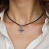 minimal_post_for_instagram_jewelry_small_cross_on_a_girl_pastel_color_uctbzbqoaqqc6z9thu2g_3-copy.webp Срібний хрестик Символ року